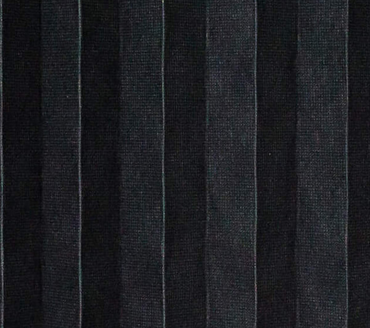 Close-up of black fabric with a textured pattern