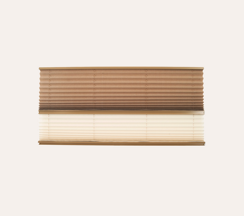Window blind with alternating light and dark slats on a white background