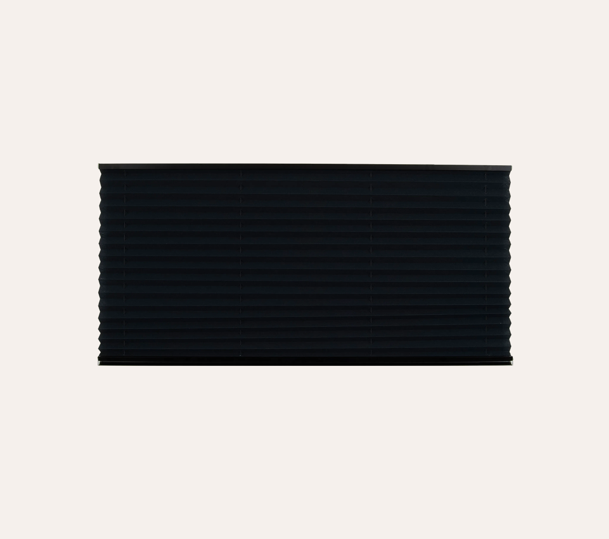 Rectangular black pleated blind on a beige background