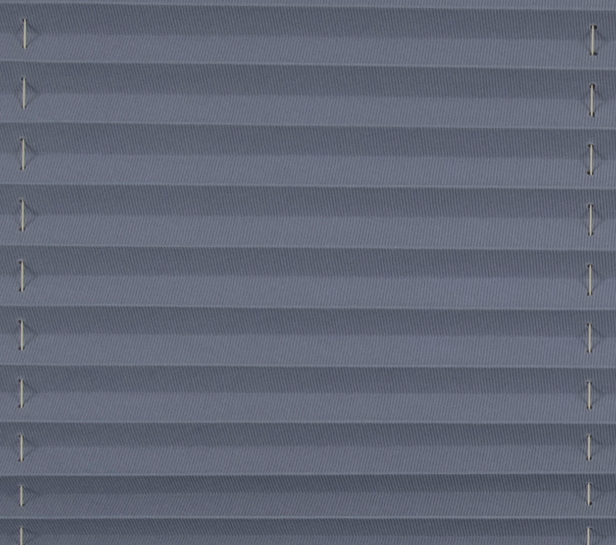 Close-up of a blue pleated blind texture